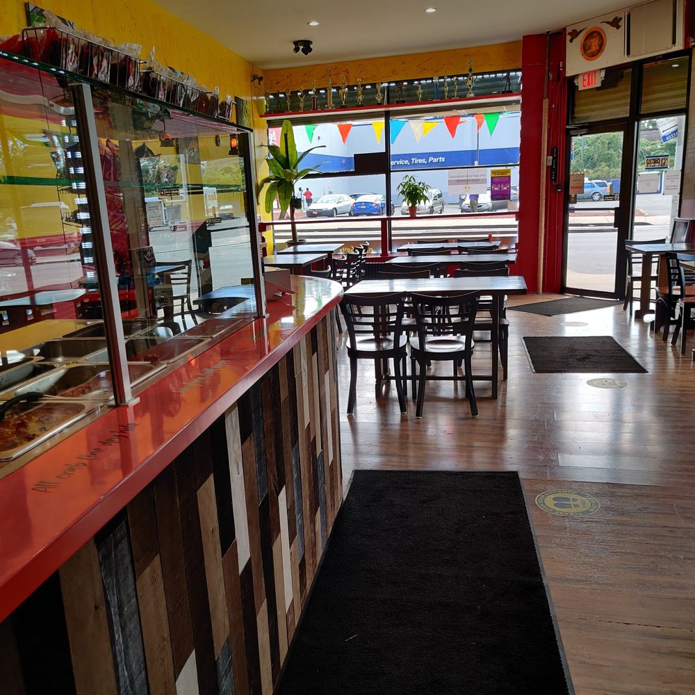 D Roti Hut - the interior of a restaurant - Caribbean Near Me - Queens Village, New York D Roti Hut - the interior of a restaurant - Caribbean Near Me - Queens Village, New York