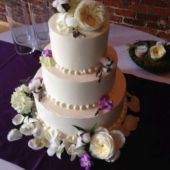 Midtown Cakes - a three tiered wedding cake - Bakeries Near Me