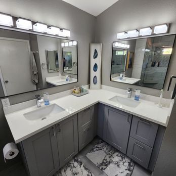 Super V Pro - a bathroom with two sinks and a toilet - General Contractors Near Me Super V Pro - a bathroom with two sinks and a toilet - General Contractors Near Me