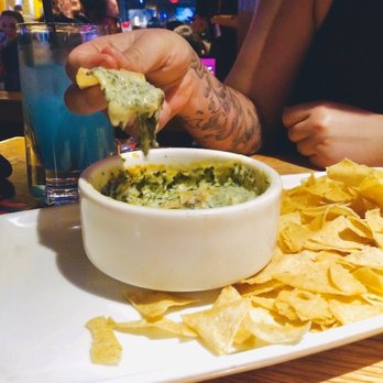 Applebee's Grill + Bar - Spinach and Artichoke Dip Margarita Fountain Drink Chips and Salsa - Sports Bars Near Me - Woodhaven, Michigan Applebee's Grill + Bar - Spinach and Artichoke Dip Margarita Fountain Drink Chips and Salsa - Sports Bars Near Me - Woodhaven, Michigan