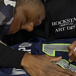 Mill Creek Sports - Jersey gets signed