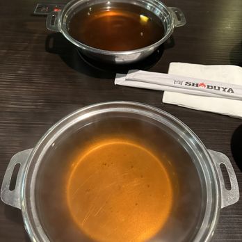 Shabuya - Sukiyaki broth (top) & Original broth (bottom) - Hot Pot Near Me - Honolulu, Hawaii Shabuya - Sukiyaki broth (top) & Original broth (bottom) - Hot Pot Near Me - Honolulu, Hawaii