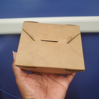 The Fancy Captain - a hand holding a cardboard box - Seafood Near Me - Santa Monica, California The Fancy Captain - a hand holding a cardboard box - Seafood Near Me - Santa Monica, California