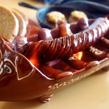 Petiscos - Flamed "Chouriço": Portuguese pork sausage cooked in flamed alcohol ($12). - Portuguese Near Me - San Jose, California