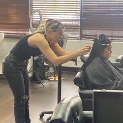 Shear Perfection Academy of Cosmetology - Finishing touches on a haircut 