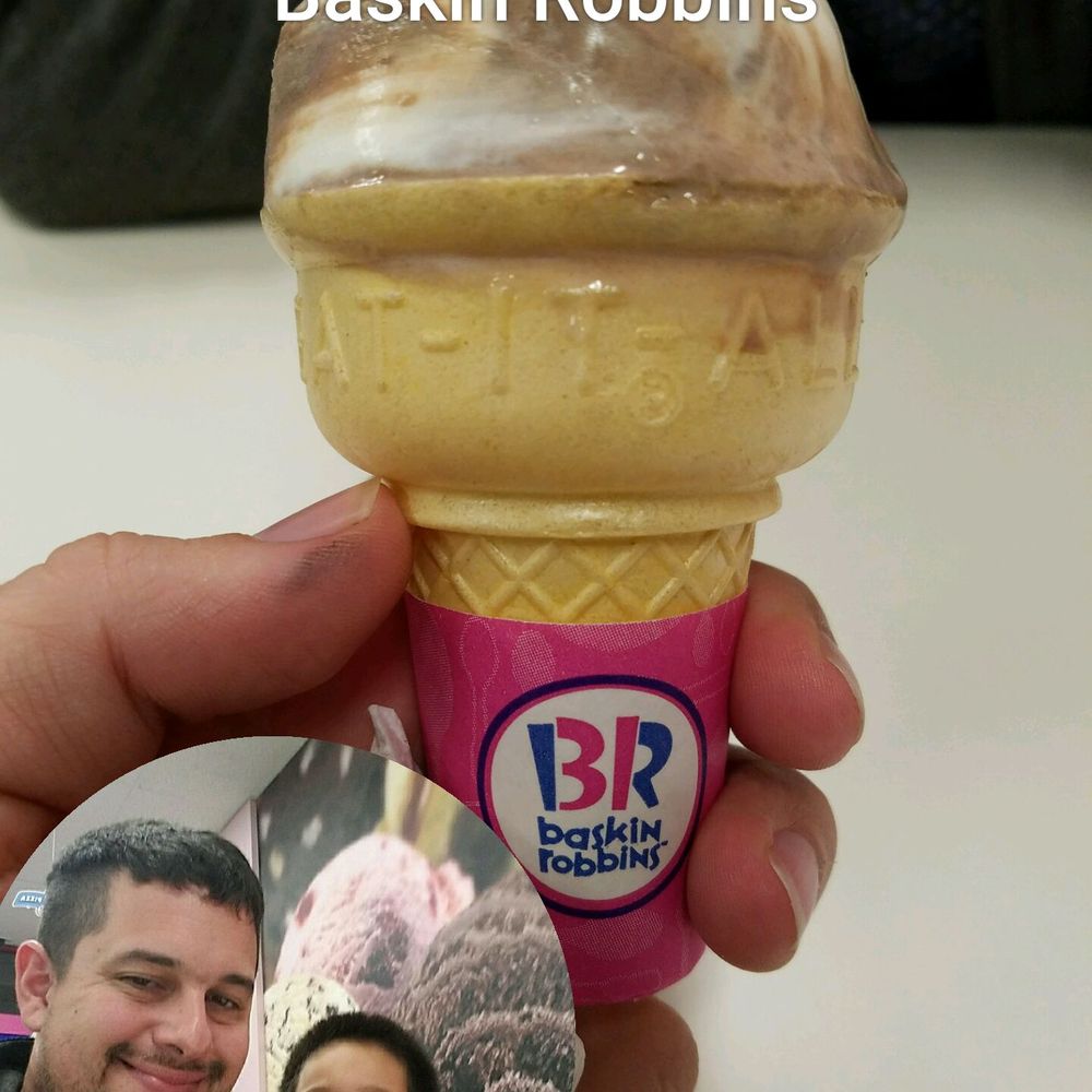 Baskin Robbins - a picture of a man and a woman holding an ice cream cone - Ice Cream & Frozen Yogurt Near Me - New Braunfels, Texas