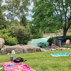 Guests will plop a towel down in grassy areas to hang out. This is near one of the many "rivers."