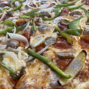 Scuotto's Pizza Cafe - Meat and Veggies - Italian Near Me - Sunrise, Florida Scuotto's Pizza Cafe - Meat and Veggies - Italian Near Me - Sunrise, Florida