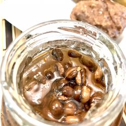 BeeWeaver Honey Farm - Texas Pecan Coffee honey jar with coffee beans right up top.