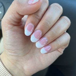 Short almond acrylics French set with white glitter tips! Short almond acrylics French set with white glitter tips!