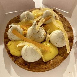 Ginger cookie base with dollops of cheesecake and lemon curd and candied ginger and lemon. Ginger cookie base with dollops of cheesecake and lemon curd and candied ginger and lemon.