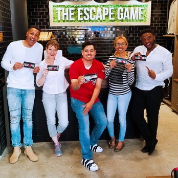 The Escape Game - me and my staff after. we escaped. with 3 minutes to spare. The Heist is a real challenge. - Escape Games Near Me - Chicago, Illinois