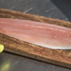 Big Brown Fish & Pay Lakes - Staff filleting fish that's caught