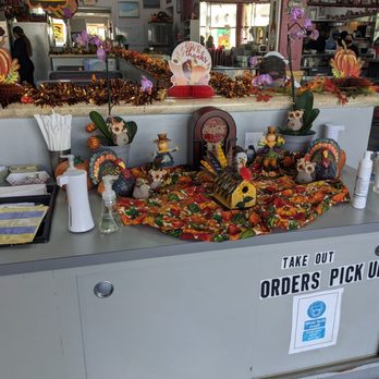 Cozy Corner - a table with a variety of items on it - Diners Near Me - Miami Springs, Florida