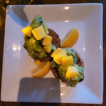 Coco Bistro Kitchen & Lounge - Crab Cakes with guacamole & Mango garnish - Cuban Near Me - Smithtown, New York Coco Bistro Kitchen & Lounge - Crab Cakes with guacamole & Mango garnish - Cuban Near Me - Smithtown, New York