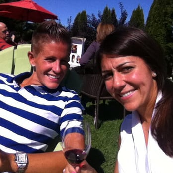 Roanoke Vineyards - sitting on adirondack chairs, enjoying the sun & wine. Hellllooo romance - Wineries Near Me - Riverhead, New York Roanoke Vineyards - sitting on adirondack chairs, enjoying the sun & wine. Hellllooo romance - Wineries Near Me - Riverhead, New York