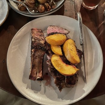 Manuela - Pork Chop with grilled peach - New American Near Me - Los Angeles, California Manuela - Pork Chop with grilled peach - New American Near Me - Los Angeles, California