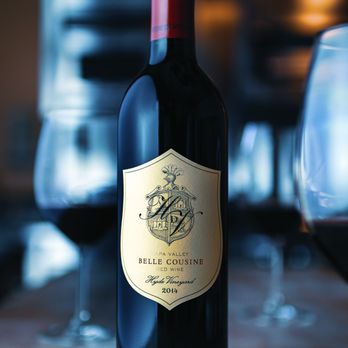 Hyde de Villaine - a bottle of wine and a glass of wine - Wineries Near Me - Napa, California Hyde de Villaine - a bottle of wine and a glass of wine - Wineries Near Me - Napa, California