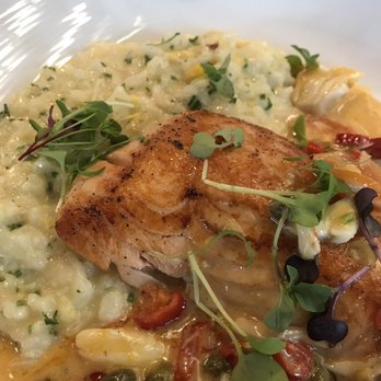 Grotto Downtown - Pan-seared salmon with sweet corn risotto - Italian Near Me - Houston, Texas Grotto Downtown - Pan-seared salmon with sweet corn risotto - Italian Near Me - Houston, Texas