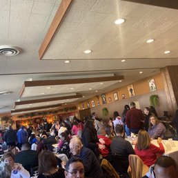 a large group of people sitting at tables