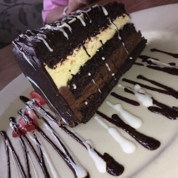 Hungry's - White & Dark Chocolate Mousse Cake - New American Near Me - Houston, Texas Hungry's - White & Dark Chocolate Mousse Cake - New American Near Me - Houston, Texas