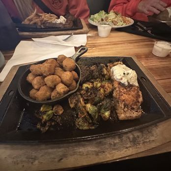 John Henry's Grill - Salmon with fried okra and brussel sprouts - Steakhouses Near Me - Rome, Georgia John Henry's Grill - Salmon with fried okra and brussel sprouts - Steakhouses Near Me - Rome, Georgia