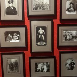 Tappi - Family photos in the foyer.