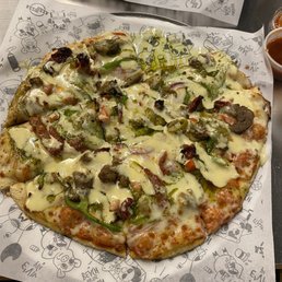 Cheese,  meatballs crumbled, onions, green peppers, mushrooms, extra cheese on top and pesto and garlic butter on top after it was cooked