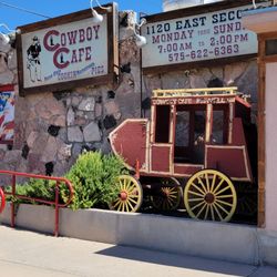 Cowboy Cafe - Outside sign with posted open hours