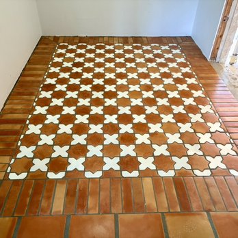 Fuentes Tile LLC - Clay tiles made in Mexico, the tiles were installed at a main entrance making a frame in the shape of a mat. - Flooring Near Me Fuentes Tile LLC - Clay tiles made in Mexico, the tiles were installed at a main entrance making a frame in the shape of a mat. - Flooring Near Me