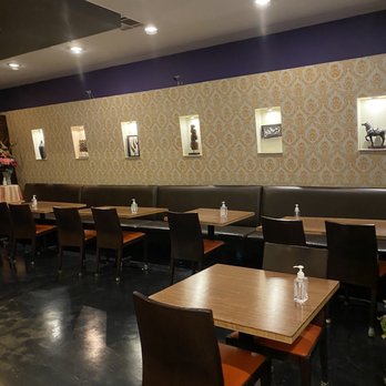 Greenview Thai - tables and chairs in a restaurant - Thai Near Me - Los Angeles, California Greenview Thai - tables and chairs in a restaurant - Thai Near Me - Los Angeles, California