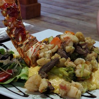 Humo's - Langosta con risotto de gandules y churrasco. - Puerto Rican Near Me - Lares, Puerto Rico