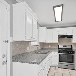 EC Construction - Paint and backsplash in kitchen for a customer that was getting home ready to sell.