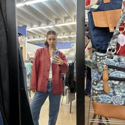 Furry Friends Thrift Boutique - This amazing red leather jacket