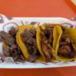 Carne asada and al pastor tacos. Delicous. Carne asada and al pastor tacos. Delicous.