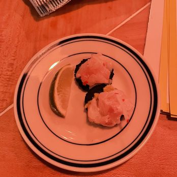 Mfk - a plate of food on a table - Seafood Near Me - Chicago, Illinois Mfk - a plate of food on a table - Seafood Near Me - Chicago, Illinois