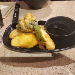Veggie tempura. $8 got 5 pics. One pc was a russet potato, which was odd.