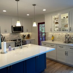 After - took out peninsula and added an island, allowing for two access points into kitchen After - took out peninsula and added an island, allowing for two access points into kitchen