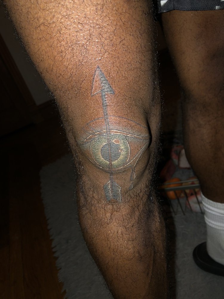 Vanity Tattoo Logo