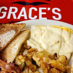 Grace's Restaurant - Scrambled eggs and bacon for me . Super delicious homefries