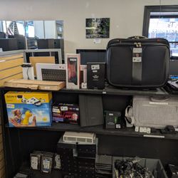 Mr. T's Electronics - Keyboards, carrying cases, DVD drives, HDDs, usb charging bricks, misc cables, wall art
