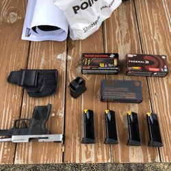 Cardinal Shooting Center - Taurus G2C with stainless slide. Shooting Sig Sauer, Winchester and Federal 9 mm Ammo.