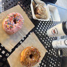 Maple bacon donut, pink frosted donut, hot latte, & vortex cinnamon roll Maple bacon donut, pink frosted donut, hot latte, & vortex cinnamon roll