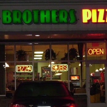 2 Brothers Pizza - a car parked in front of a restaurant - Pizza Near Me - Harrisburg, Pennsylvania