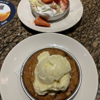 BJ's Restaurant & Brewhouse - White Chocolate Macadamia Nut Pizookie and a Strawberry Shortcake Pizookie, mini sized. - American Near Me - Arcadia, California BJ's Restaurant & Brewhouse - White Chocolate Macadamia Nut Pizookie and a Strawberry Shortcake Pizookie, mini sized. - American Near Me - Arcadia, California