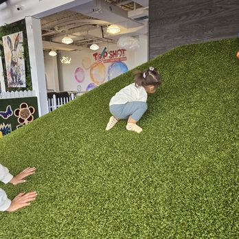 Top Shot - Climbing up the hill. - Indoor Playcenter Near Me - Maui, Hawaii