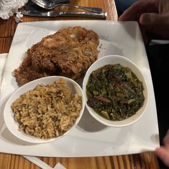 Southern Soul Kitchen - Pork chop, greens and dirty rice. - Soul Food Near Me - Rosenberg, Texas