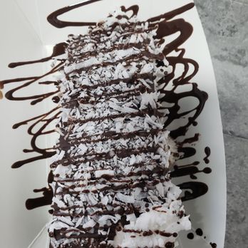 The Paleta Bar - Strawberry Cheesecake Paleta bar fully dipped in dark chocolate and topped with coconut. - Desserts Near Me - Wildomar, California The Paleta Bar - Strawberry Cheesecake Paleta bar fully dipped in dark chocolate and topped with coconut. - Desserts Near Me - Wildomar, California