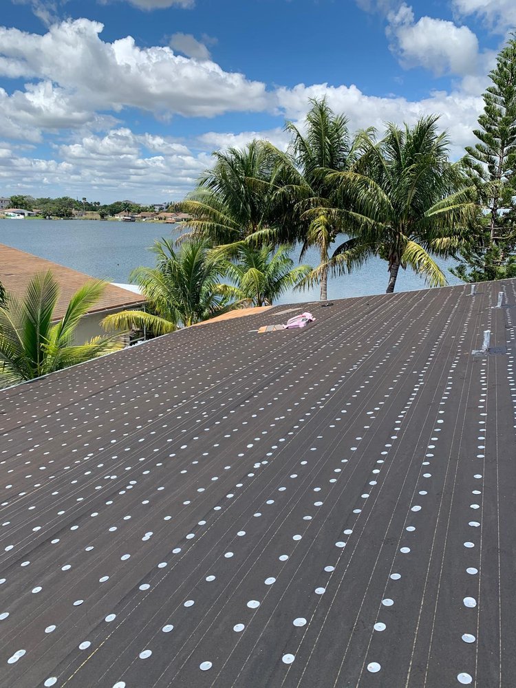 Slide of JVV Roofing