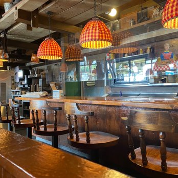 Country Cousin - a row of bar stools in a restaurant - American Near Me - Centralia, Washington Country Cousin - a row of bar stools in a restaurant - American Near Me - Centralia, Washington